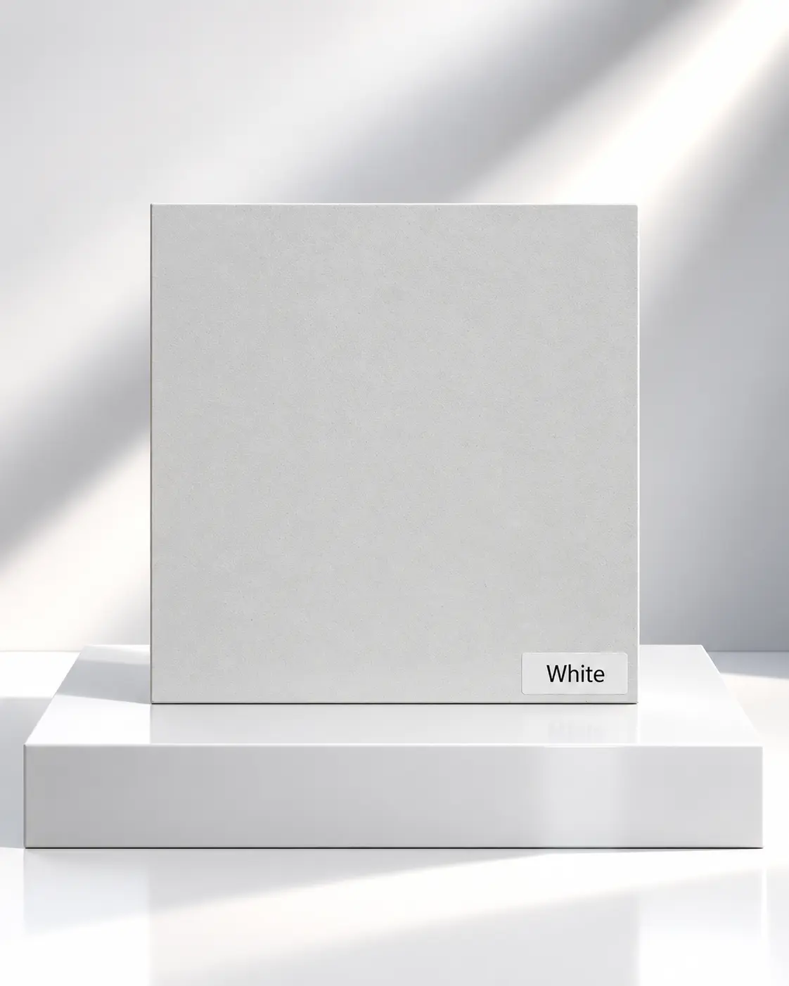 White solid wardrobe panel sample on a white plinth