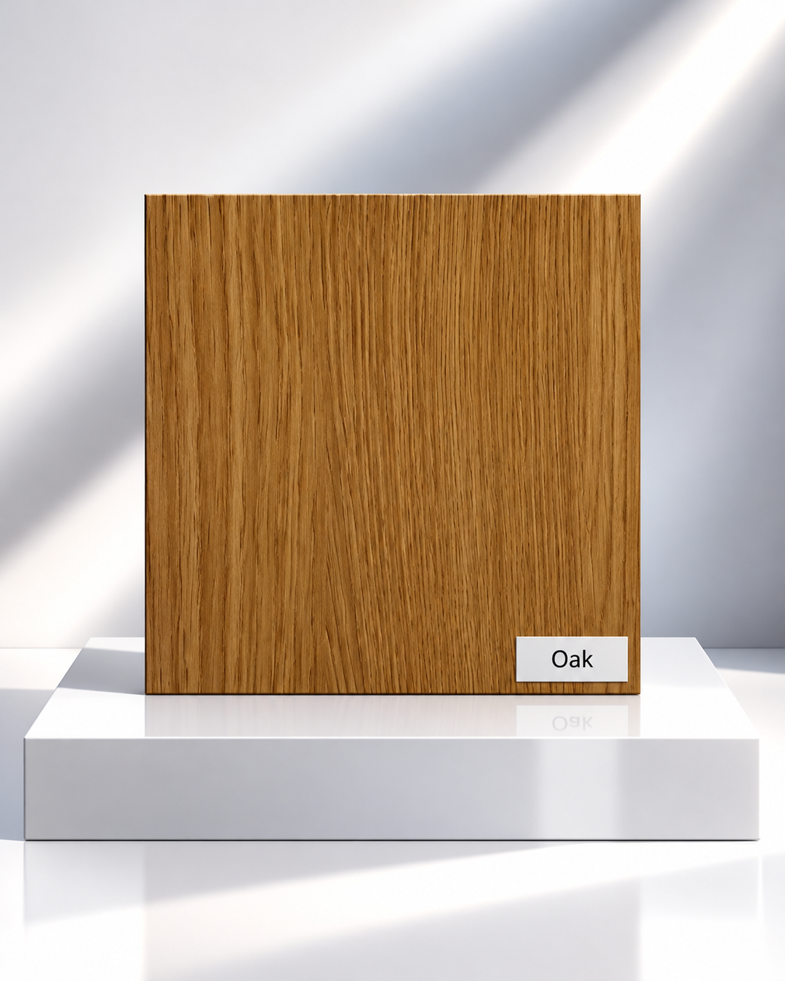 Oak wood-effect wardrobe panel sample with vertical grain on a white plinth